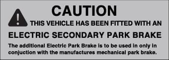 Safety warning label to be attached to vehicle door after DBA electric secondary park brake installation Caution label for electric secondary park brake stating 'This vehicle has been fitted with an electric secondary park brake' with usage instructions